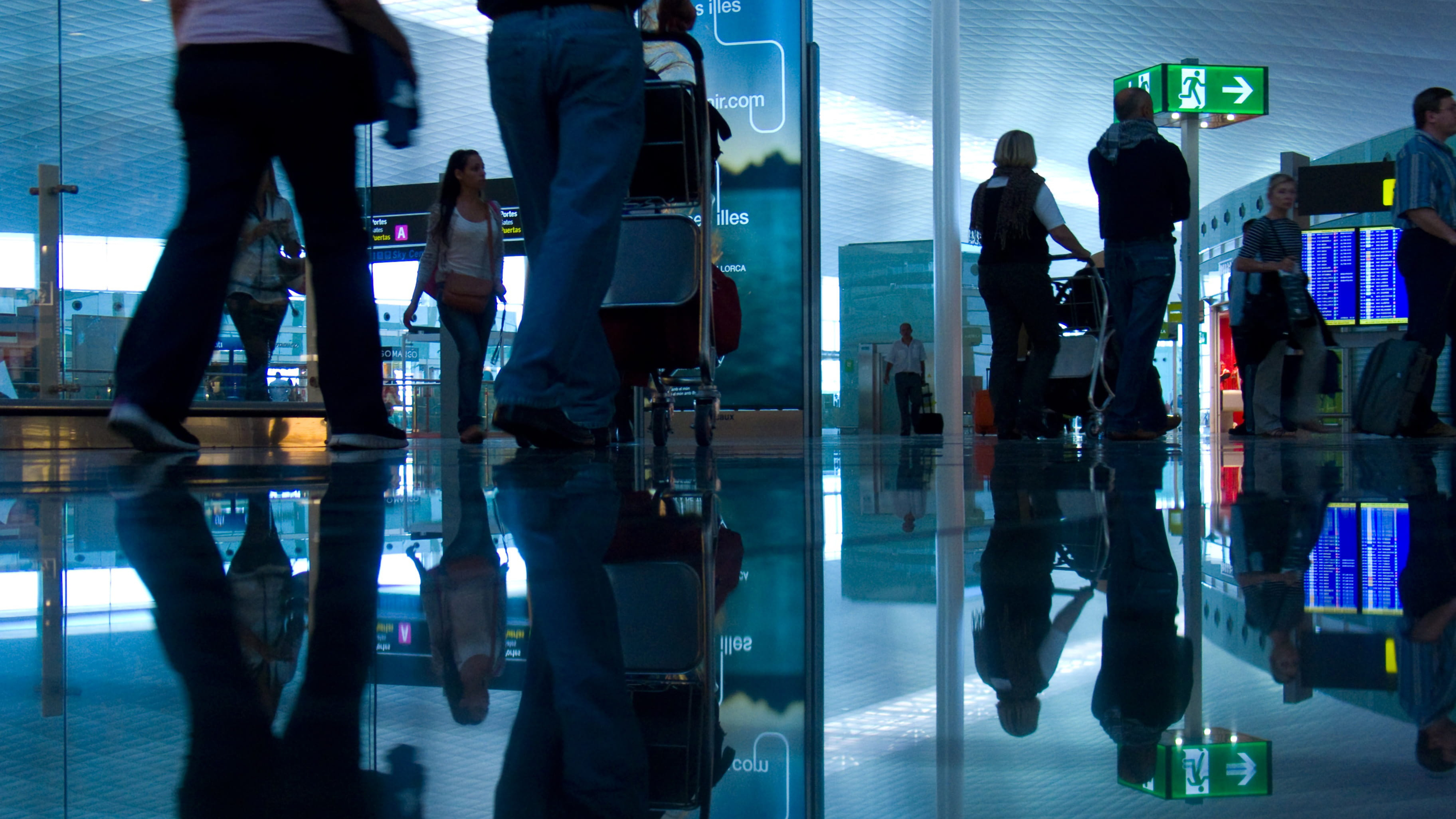Business travelers in airport terminal
